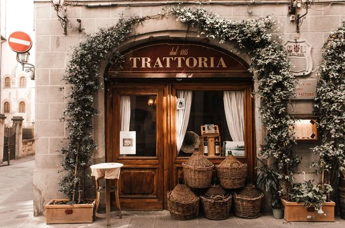 An ivy-framed trattoria doorway in Trastevere